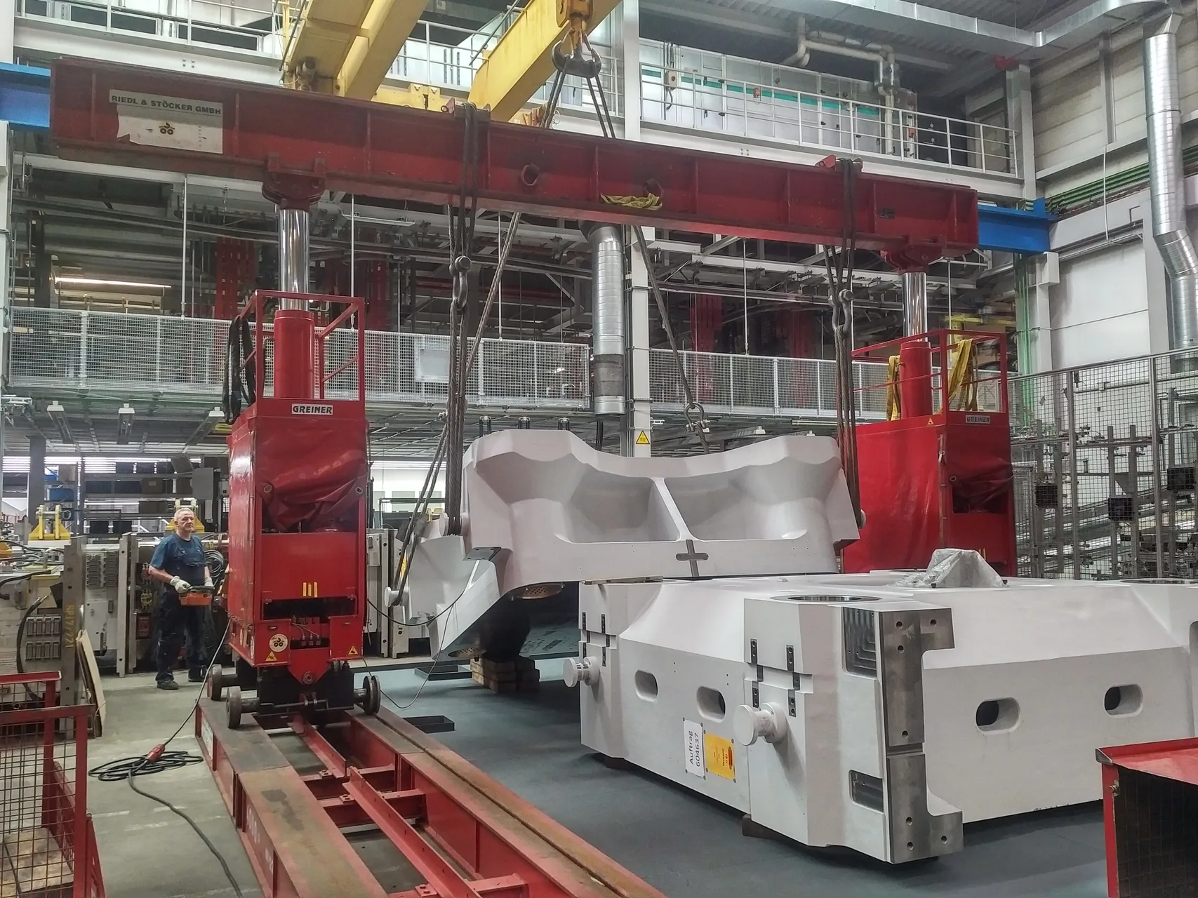 Krauss Maffei 3200-17200 MX injection moulding machine assembly at Rehau Feuchtwangen